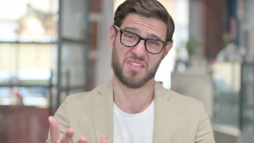 Adult Man Talking with Frustration Close Up