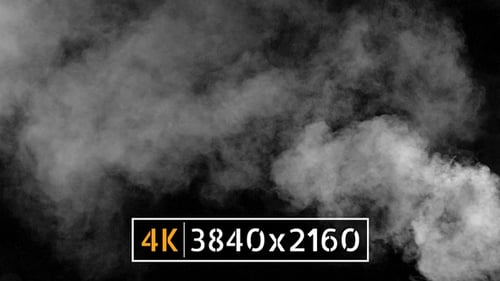 White Smoke Billowing Across a Black Background
