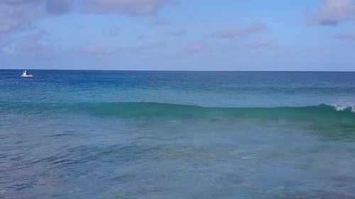 Drone aerial scenery of shore beach by blue ocean and sand background
