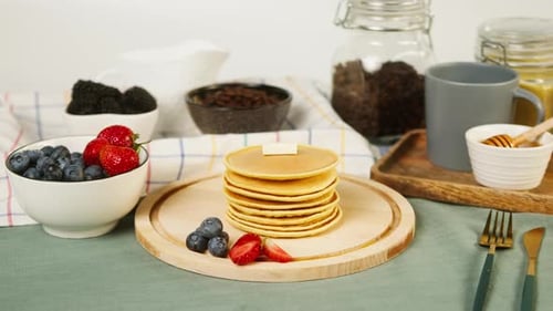 Pancakes with Berries and Chocolate Chips for Breakfast