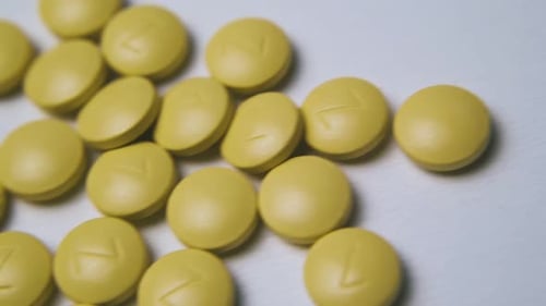 Pills, Capsules and Medicine on a White Surface
