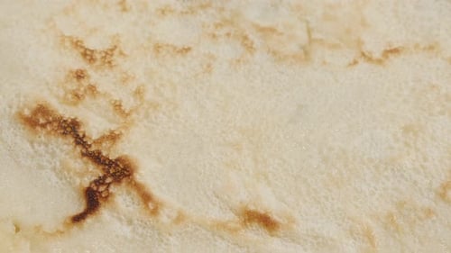 Close-Up of a Delicious Golden Pancake or Crepe