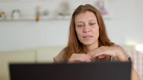 Woman Explains Concept During Online Video Conference