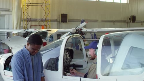 Aircraft Mechanics Testing Airplane Systems