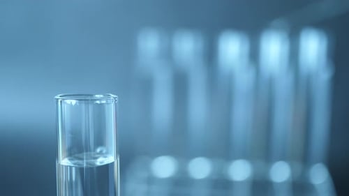 Pipette Drops Red Liquid into Test Tube