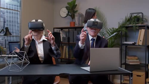 Senior Adults Using VR Technology in Modern Office