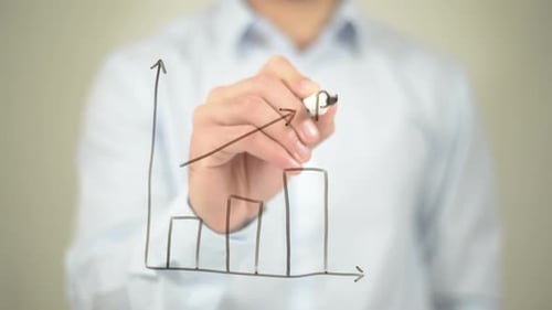 Hand Drawing Profit Graph on Transparent Screen