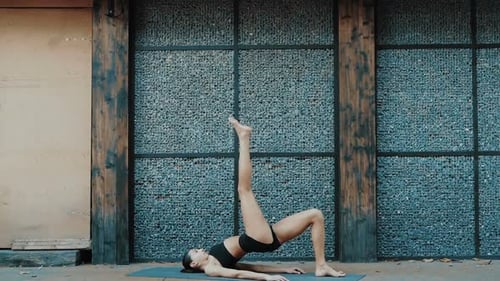 Young beautiful woman practicing yoga. Wellness concept. Calmness and relax, woman happiness. Toned