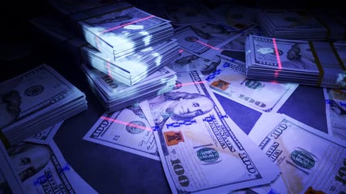 UV Light Scan Verifying US Dollar Banknotes