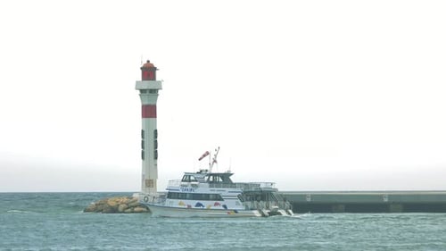 Lighthouse on Background of Sky.