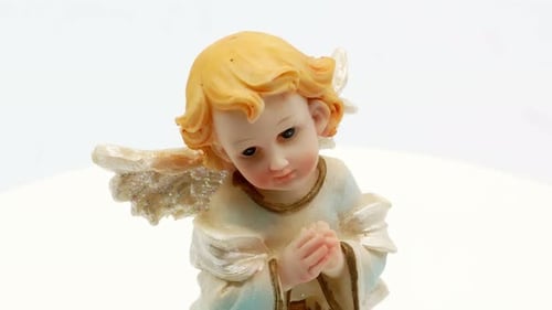 Sweet Angel Statue Praying on White Background