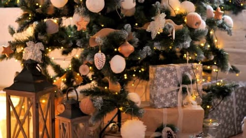 Decorated Christmas Tree with Gifts at Home