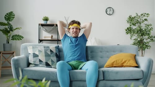 Man Eats Burger Instead of Working Out