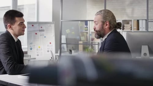 Businessmen Meeting in Modern Office Space
