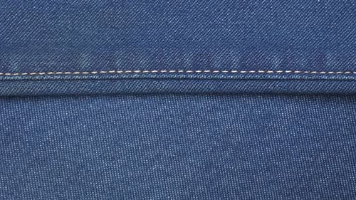 Detailed Close Up of Dark Blue Denim Fabric
