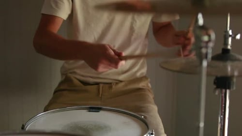 Drummer Playing Drums Close Up Indoors