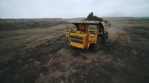 Flying Over a Giant Truck with Coal