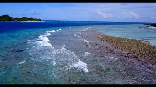 Aerial drone shot travel of perfect island beach holiday by blue ocean with clean sandy background o