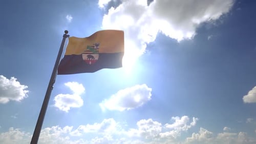 Saxony-Anhalt Flag Waving in Sunny Blue Sky