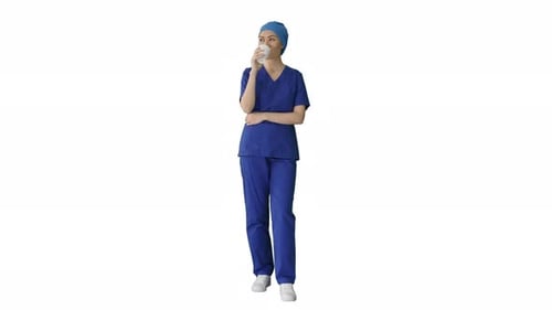Woman in Scrubs Walking and Drinking