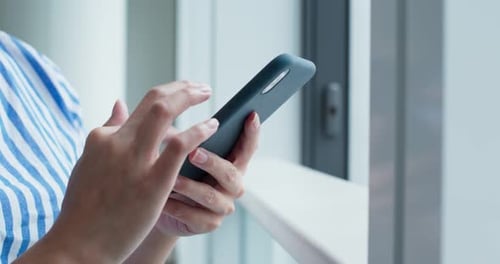 Close up of woman use of mobile phone