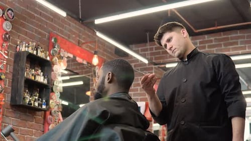 Barber Giving Haircut in Urban Barber Shop