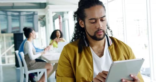 Male creative working in a modern office