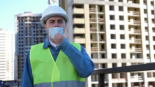Worker Staff in White Helmet Put on and Put Off Medical Mask at Construction Site