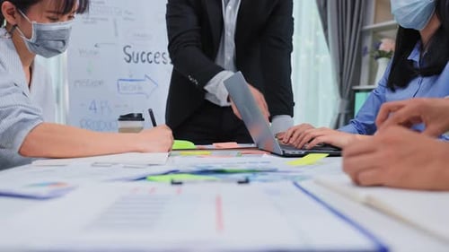 Business Team Planning Strategy in Office Meeting