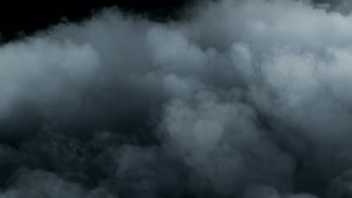 Abstract Smoke Clouds Moving Against Black Background