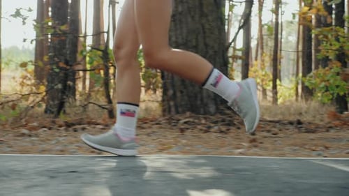 Morning Jogging Through the Forest, Only Legs Closeup