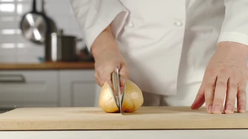 Chef Cuts an Onion in Half