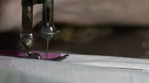 Sewing Machine Stitching White Patterned Fabric
