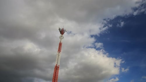 4k Time-lapse of telecommunications tower and the sky