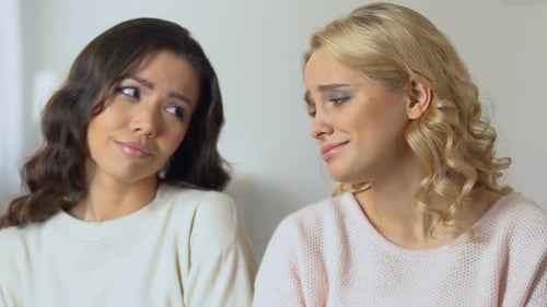 Woman Comforting Her Sad Friend