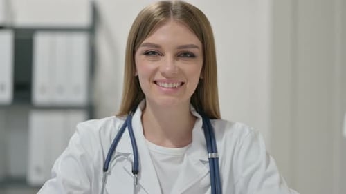 Smiling Woman Doctor with Stethoscope Close Up