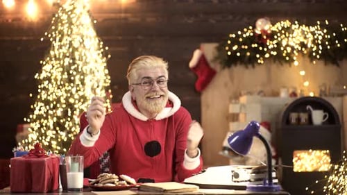 Man with Sparkler Laughing at Christmas Party
