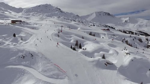 Aerial view of people skiing at a ski resort