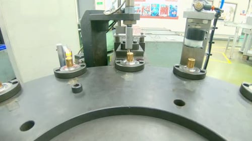 Advanced robotic machine manufacturing parts in an automated assembly line