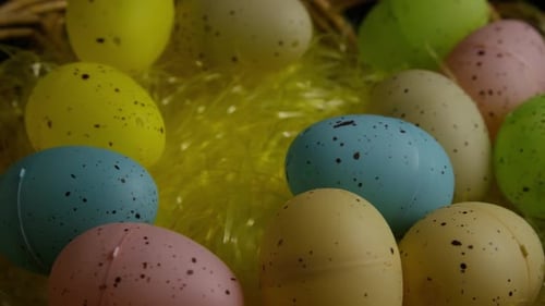 Easter Eggs in Basket with Colorful Nesting