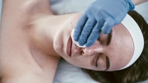 Woman Receiving a Cosmetic Injection Treatment