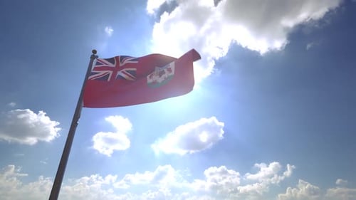 Bermuda Flag Waving Proudly in Bright Sunny Sky