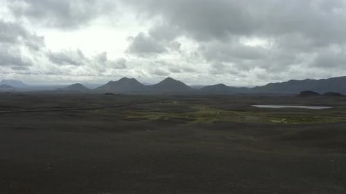 Aerial Panorama Of Vast Black Desert Landscape In Iceland. panning right