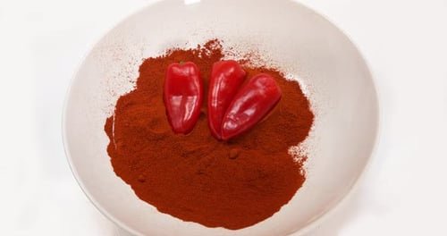 Paprika, capsicum annuum, falling against White Background, Slow Motion 4K
