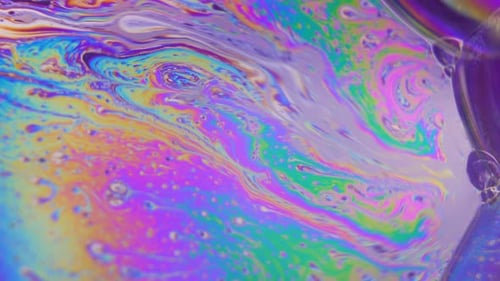 Abstract Iridescent Colors Flowing on Bubble Surface