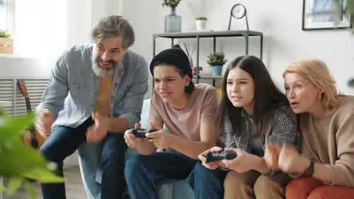Family Playing Video Games Together at Home