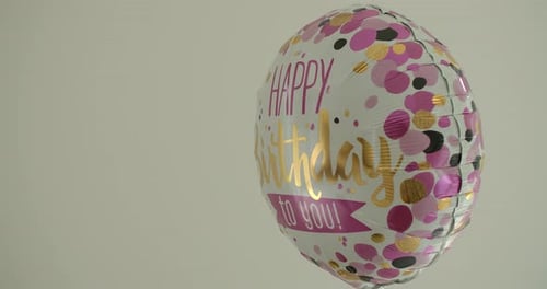Shiny Birthday Balloon with Pink and Gold Confetti