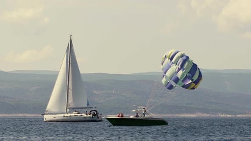 Parasailing boat in sea