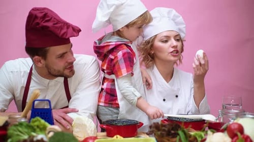 Happy Family Cooking Together in the Kitchen