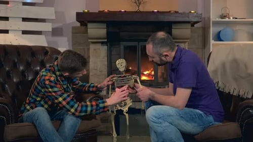 Dad Learning Son Sthe Structure of Internal Organs of Human Body